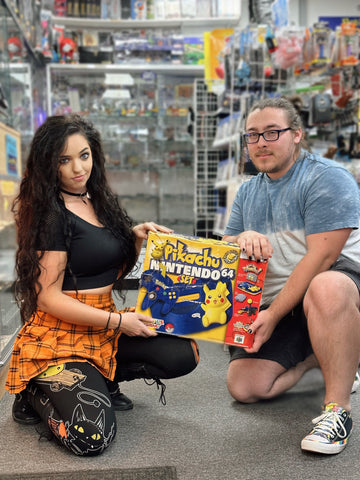 System - Blue Pikachu Edition (Toys R Us Exclusive) (Nintendo 64) Pre-Owned: System, Controller, AV Cord, Power Supply, Game, VRU, Styrofoam Insert, and Box (STORE PICK-UP ONLY)