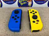Wireless Controllers: Joy-Con (L)/(R) - Fortnite Edition (Blue & Yellow) Official (Nintendo Switch) Pre-Owned w/ Wrist Straps and Box (As Pictured)