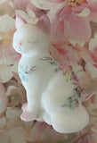 Fenton Art Glass / Sitting Cat / Burmese White Satin with Pink Accent and Roses / Hand-Painted and Signed by Artist A. Farley / Approx. 3 3/4"/ Stamped with Fenton Logo in Glass / No Original Box (Pre-Owned)