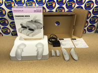 Charging Dock - White (Insignia) (Oculus Quest 2) Pre-Owned: 2 Batteries, 2 Battery Covers, Power Adapter, Docking Station, 2 Manuals, and Box (As Pictured)
