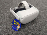 System - 128GB Edition - White (Oculus Quest 2) Pre-Owned: Headset w/ Replacement Strap, Left and Right Hand Controllers, and Anker Charging Dock w/ Charger