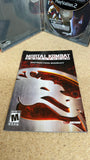 Mortal Kombat: Armageddon - Premium Edition (Johnny Cage / Goro) (Playstation 2) Pre-Owned: Game, Bonus DVD, Manual, Steelbook Case (As Pictured)