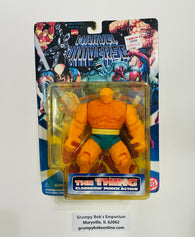 1995 / Toy Biz / Marvel Comics / Marvel Universe / THE THING - Clobberin' Punch Action / New on Card / Card Shows Some Wear from Age and Shelf Wear - Bumped Corners / See Pictures