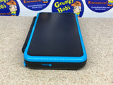 System - Black & Turquise (New Nintendo 2DS XL) Pre-Owned w/ Stylus, Charger, AR Cards, Quick Start Insert, Cardboard Insert, and Box (As Pictured)