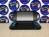 System - Black & Turquise (New Nintendo 2DS XL) Pre-Owned w/ Stylus, Charger, AR Cards, Quick Start Insert, Cardboard Insert, and Box (As Pictured)