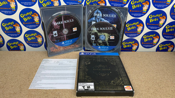 Dark Souls Trilogy (Playstation 4) Pre-Owned w/ Steelbook Case (As Pictured)