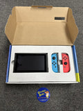 System w/ Docking Station + Neon Blue and Neon Red Joy-Cons w/ Grip Adapter Controller & Strap Adapters + AC Adapter + HDMI Cord (Nintendo Switch) Pre-Owned w/ Fortnite Double Helix Edition Box