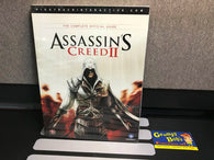Assassin's Creed II (The Complete Official Guide) (Piggyback) NEW (As Pictured)