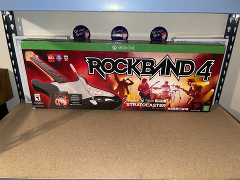Rock Band 4 Wireless Guitar Bundle [Black & White] (Xbox One) Pre-Owned: Game, Guitar, Strap, Manual, and Box