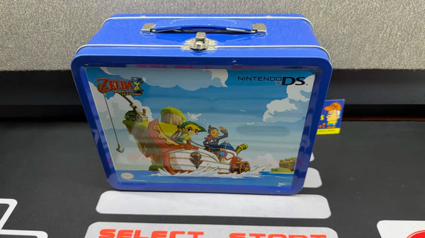 The Legend of Zelda: Phantom Hourglass LUNCHBOX w/ Accessories [NO GAME] (Nintendo DS) Pre-Owned w/ Carrying Case, Headphones, Green Stylus, Grey Stylus, 2 Blue Silicon Cartridge Protectors, and System Decals (As Pictured)