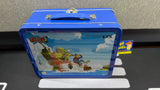 The Legend of Zelda: Phantom Hourglass LUNCHBOX w/ Accessories [NO GAME] (Nintendo DS) Pre-Owned w/ Carrying Case, Headphones, Green Stylus, Grey Stylus, 2 Blue Silicon Cartridge Protectors, and System Decals (As Pictured)