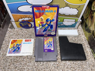 Mega Man 4 (Nintendo) Pre-Owned: Game, Manual, Dust Cover, Styrofoam, and Box