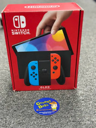 System - OLED Model (Nintendo Switch)  Pre-Owned w/ Neon Blue & Red Joy-Con Controllers w/ Wrist Straps & Comfort Grip + Dock, HDMI, AC Adapter, and Box (In Store Sale and Pick Up ONLY)