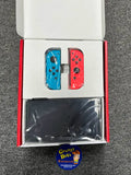 System - OLED Model (Nintendo Switch)  Pre-Owned w/ Neon Blue & Red Joy-Con Controllers w/ Wrist Straps & Comfort Grip + Dock, HDMI, AC Adapter, and Box (In Store Sale and Pick Up ONLY)