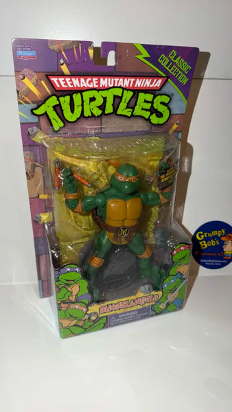 Teenage Mutant Ninja Turtles: Classic Collection - Michelangelo [Action Figure] 2012 (Playmates) NEW (Box is taped/Foot is loose inside package/As is)