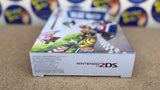 System - Electric Blue 2 (Blue & Black) (Nintendo 2DS) Pre-Owned w/ Stylus, Charger, Quick Start Insert, AR Cards, Cardboard Insert, and Mario Kart 7 Edition Box (Matching Serial Number) (As Pictured)