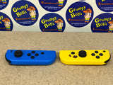 Wireless Controllers: Joy-Con (L)/(R) - Fortnite Edition (Blue & Yellow) Official (Nintendo Switch) Pre-Owned w/ Wrist Straps and Box (As Pictured)