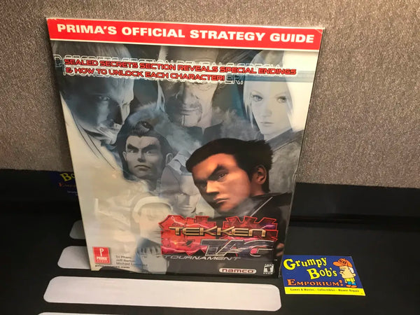 Tekken Tag Tournament (Official Strategy Guide) (Prima Games) Pre-Owned (Sealed Secrets Section - Sealed) (Pictured)