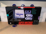 System - Original Model (Super Nintendo) Pre-Owned: System, Super Mario World Game w/ Manual, 2 Controllers, AC Adapter, AV + RFU Cord, Manuals, Inserts, Styrofoam, and Box (IN-STORE SALE AND PICKUP ONLY)