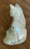 Fenton Art Glass / Sitting Cat / White Opalescent with Heart and Flowers / 1985-1996 Fenton Label / Stamped with Fenton Logo in Glass / Signed by Artist C. Smith / Approx 3 3/4" / No Original Box (Pre-Owned)