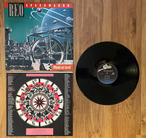 REO Speedwagon / "Wheels Are Turnin'"/ 1984 Epic Records / QE 39593 / USA / (Vinyl) Pre-Owned