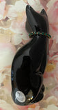 Fenton Art Glass / Stylized Sitting Cat / Approx. 5"/ Black Glass, Green Rhinestone Collar, Yellow(?) Eyes / 1985-1996 Fenton Label / Stamped with Fenton Logo in Glass / See Notes / No Original Box (Pre-Owned)