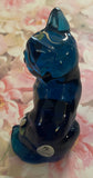Fenton Art Glass / Sitting Cat / Indigo Blue Glass / Cherry Blossoms /  1985-1996 Fenton Label and Original Price, Catalog Number and Barcode Label on Bottom / Stamped with Fenton Logo in Glass / Approx. 3 3/4" / No Original Box (Pre-Owned)
