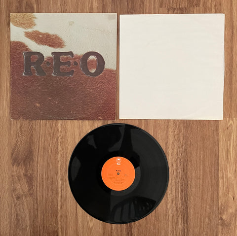 R.E.O. Speedwagon: "R.E.O." (Self-Titled)  PE 34143 Stereo / 1976 Epic Records/CBS, Inc. / USA / (Vinyl) Pre-Owned (Note: See Cover Condition Notes Below)
