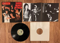 Queen: "Sheer Heart Attack" / 7E-1026 SP Stereo / Butterfly Label / (Believed to be Reissue ) /  1974 Elektra/Asylum/Nonesuch Records / USA / Includes Two-Page Lyric/Poster Foldout / (Vinyl) Pre-Owned